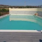 Immagine 3 azienda PISCINE NAXOS Immobiliare e ristrutturazioni in Giarre CT